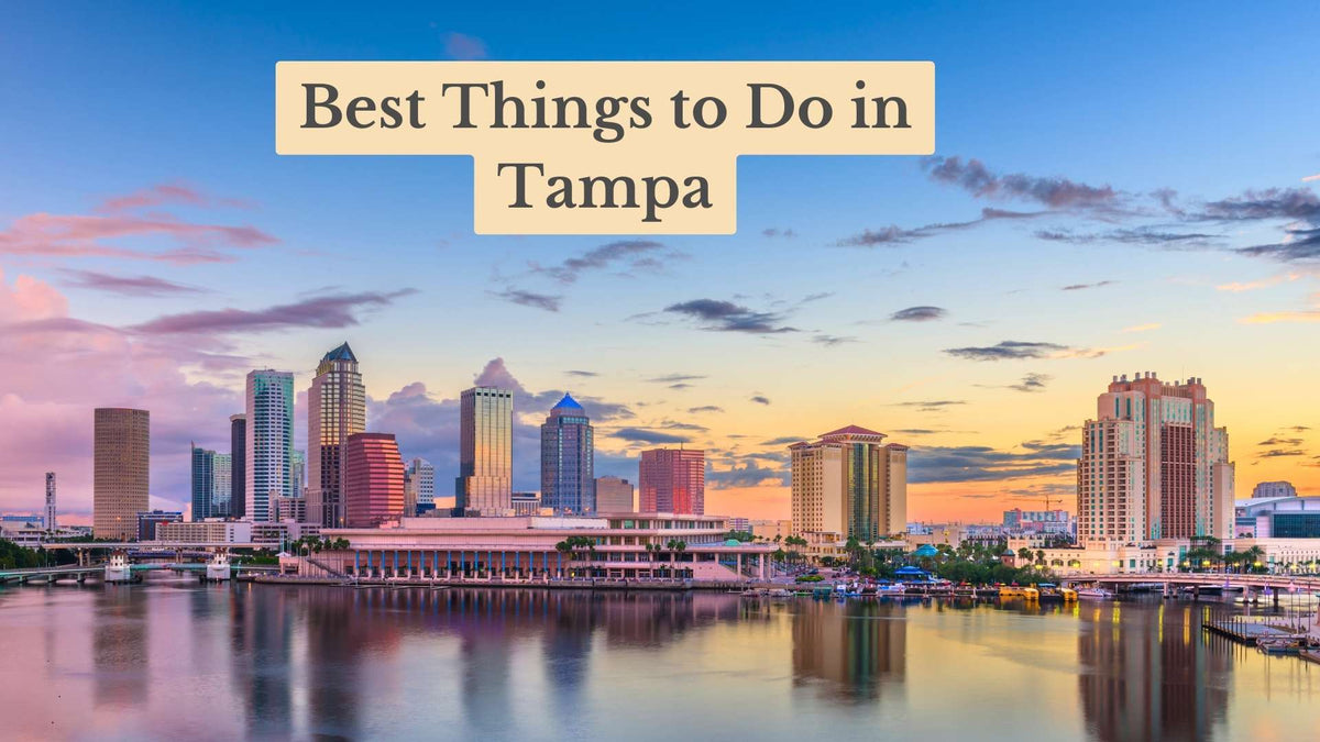 Tampa skyline at sunset reflected in the water, with title text "Best Things to Do in Tampa"
