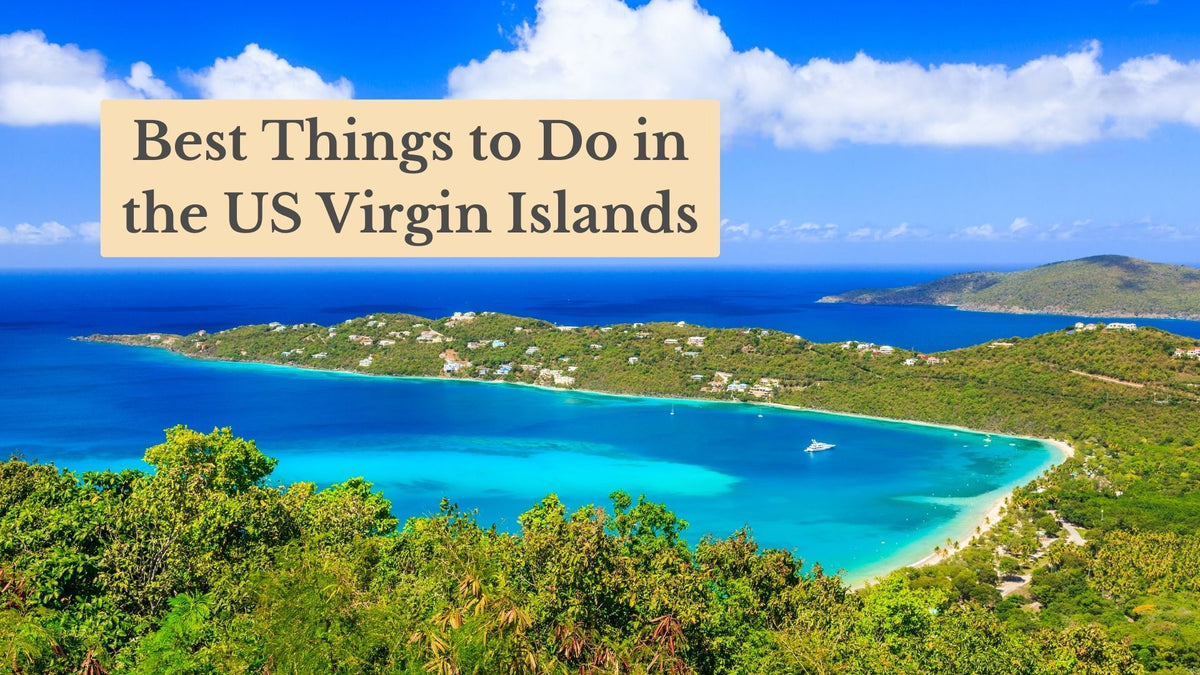 Title card "Best Things to Do in the US Virgin Islands" over an aerial view of a turquoise bay, green hills and a white boat.