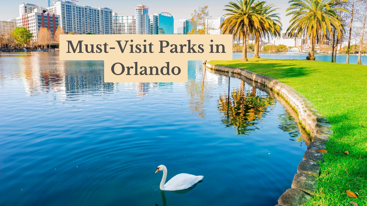 Title card "Must-Visit Parks in Orlando" over a white swan on a blue lake beside a grassy, palm-lined shore with city buildings behind