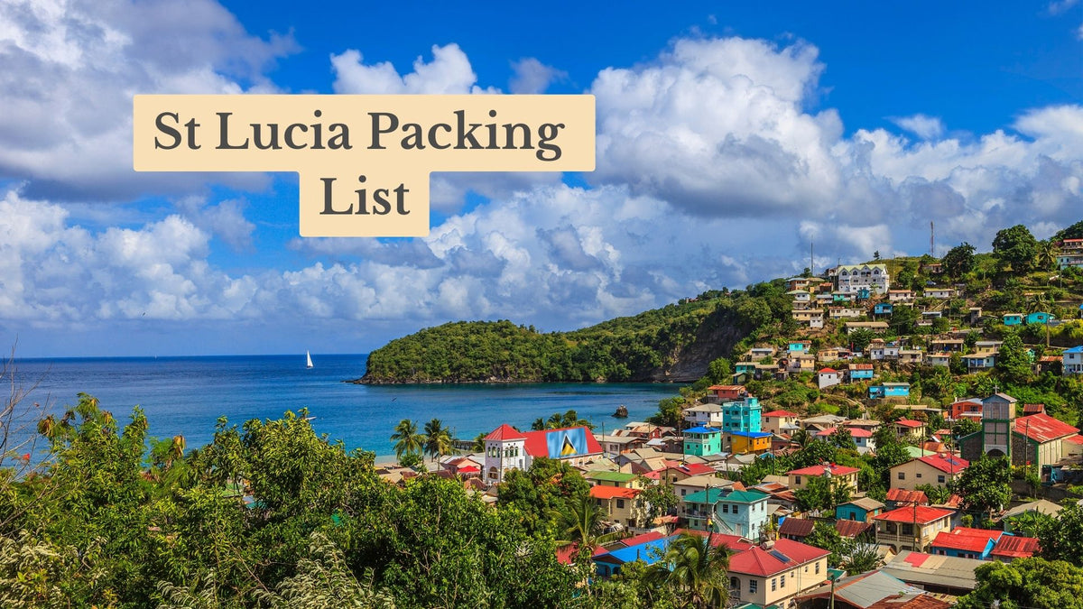 Title card "St Lucia Packing List" over colorful hillside houses above a blue bay with a green headland and a distant sailboat