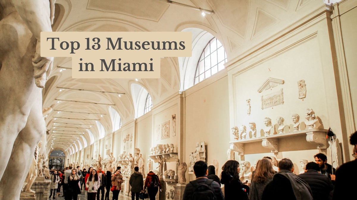 Visitors walk through a long vaulted gallery lined with white marble busts and statues; title text reads "Top 13 Museums in Miami".