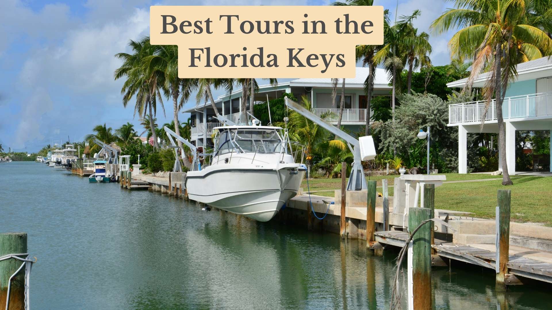 Title card "Best Tours in the Florida Keys" over a white motorboat docked in a calm canal lined with palm trees and waterfront houses