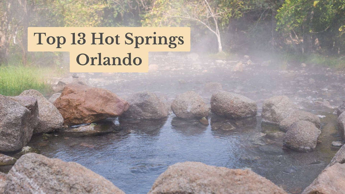 Steam rises from a natural hot spring pool ringed by boulders, with title text "Top 13 Hot Springs Orlando"