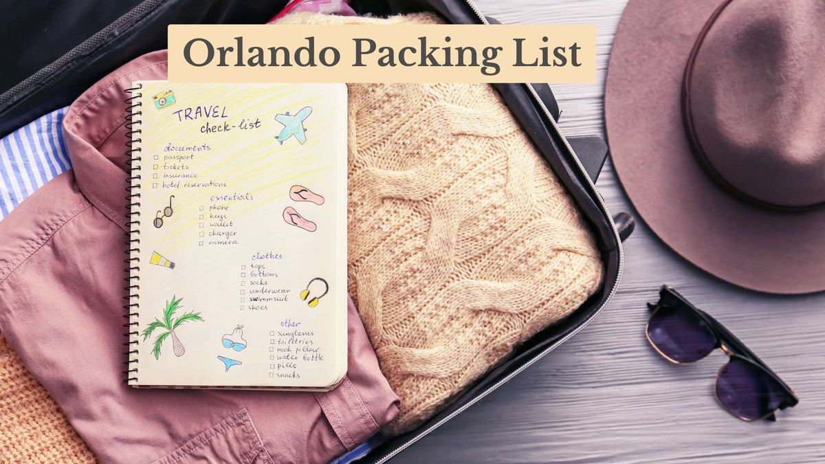 Orlando Packing List title over an open suitcase with a hand-drawn travel checklist notebook, folded sweater, hat and sunglasses